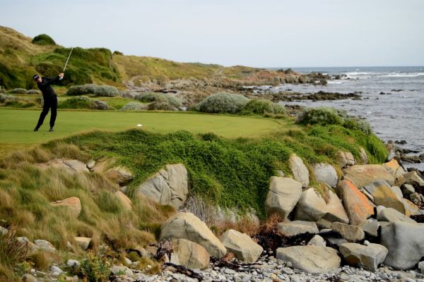 Golfer teeing off at Barnbougle